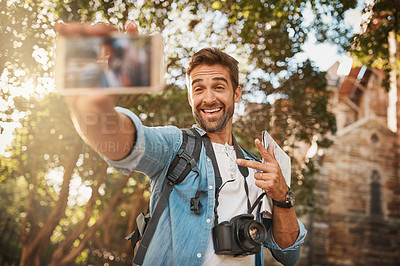 Buy stock photo Happy man, tourist and peace sign selfie in a city for travel with holiday memory, smile and happiness. Male person outdoor on adventure, journey or vacation photo and freedom with a backpack