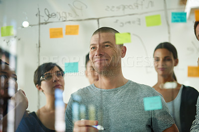 Buy stock photo Innovation, planning and strategy at work with group of business people working together. Happy, excited and creative team brainstorming, sharing vision and ideas while writing on sticky notes