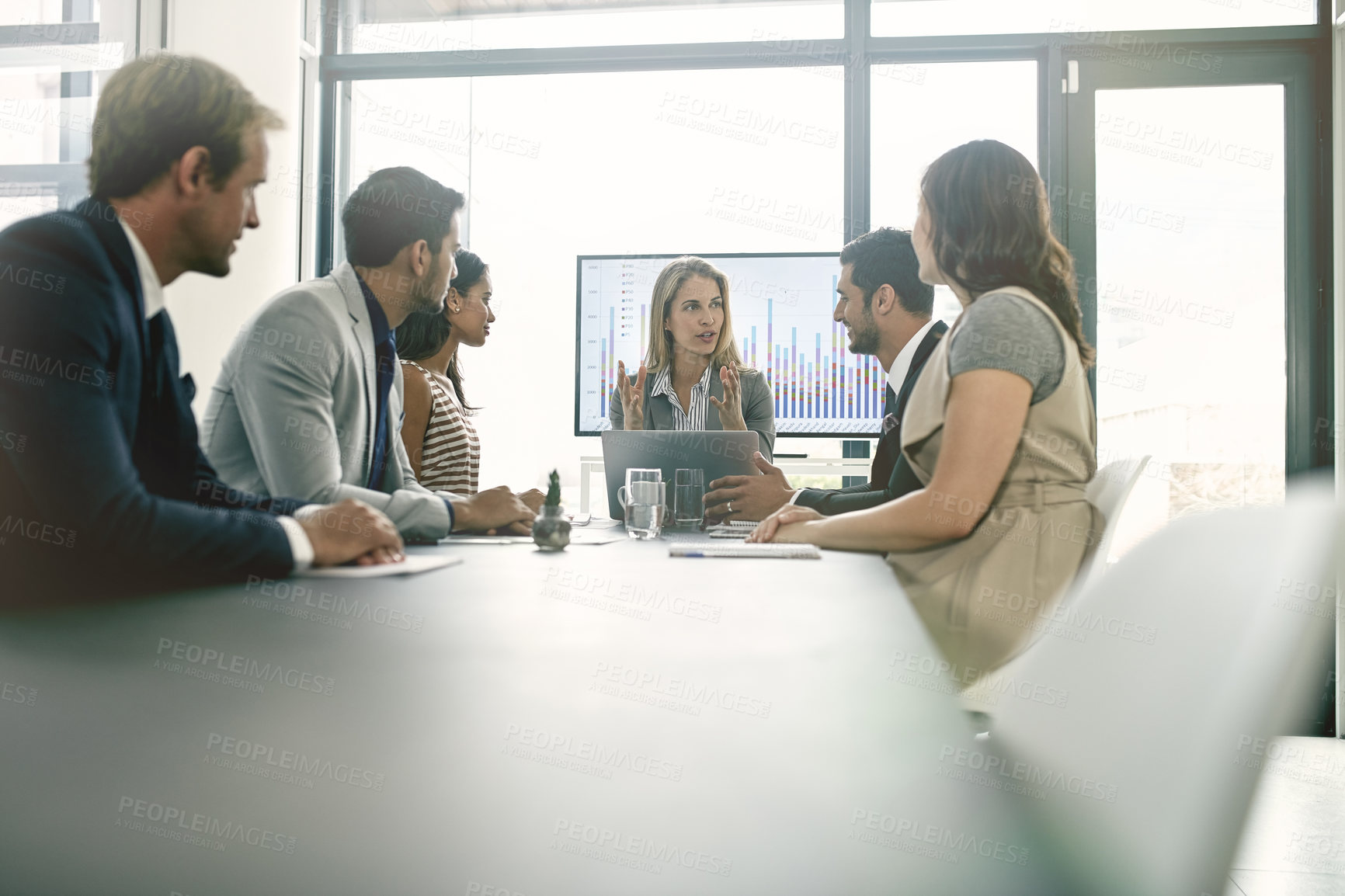 Buy stock photo Meeting, planning and business people in office with graphic and confidence, collaboration and support. Discussion, diversity and team of corporate accountants with finance, brainstorming and group