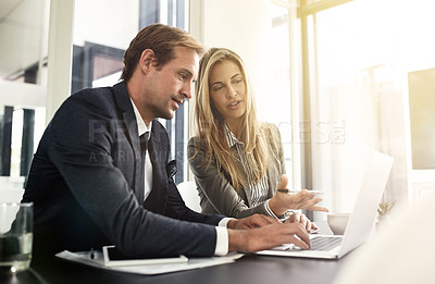 Buy stock photo Business man, woman or partner on laptop and pointing, typing or help with question, talking or workplace. Businessman, female manager and computer for corporate training, teamwork or solution at job
