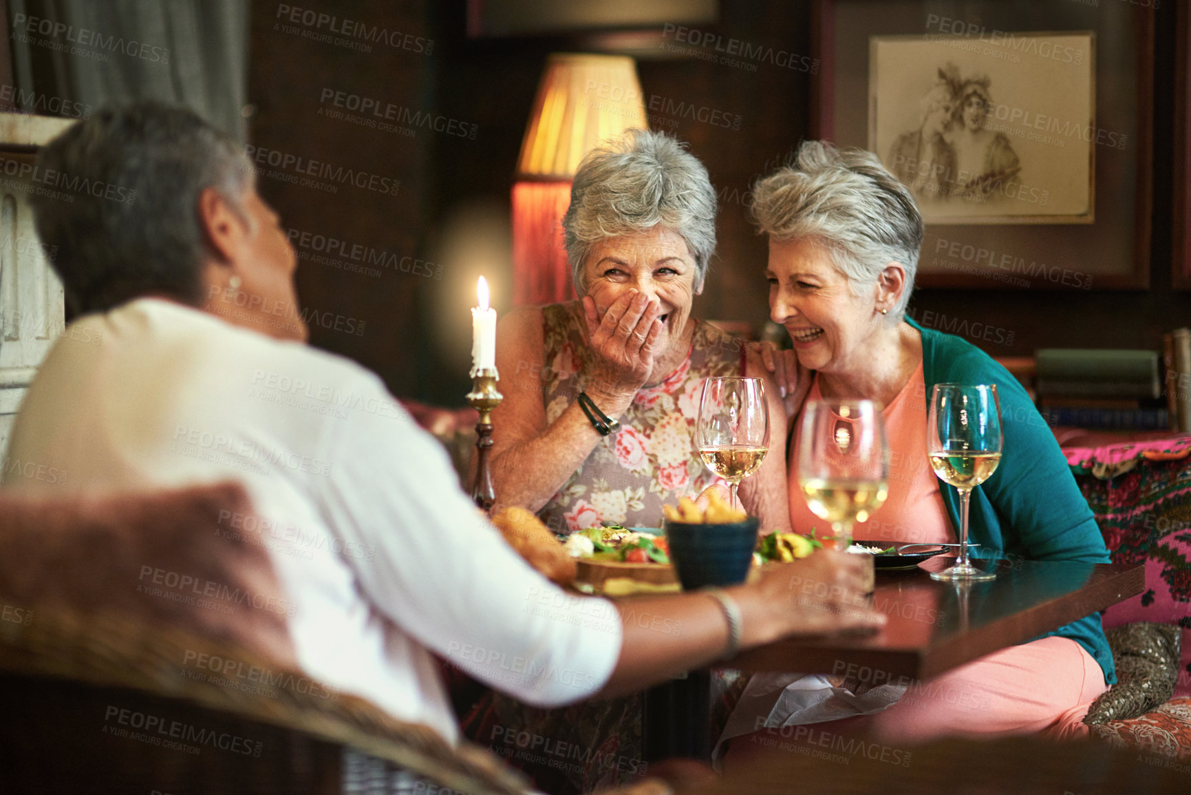 Buy stock photo Cropped shot of a group of senior female friends enjoying a lunch date