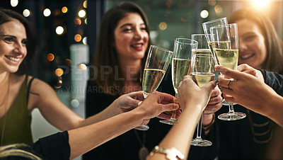 Buy stock photo Toast, party and champagne with friends at restaurant for celebration, wine and social event. Happy, diversity and luxury with group of people drinking together for fine dining, cheers and free time