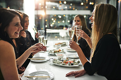Buy stock photo Shot of friends having a dinner party at a restaurant