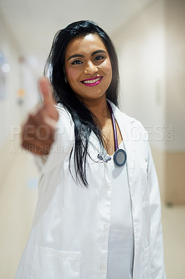 Buy stock photo Portrait of a doctor showing thumbs up in a hospital