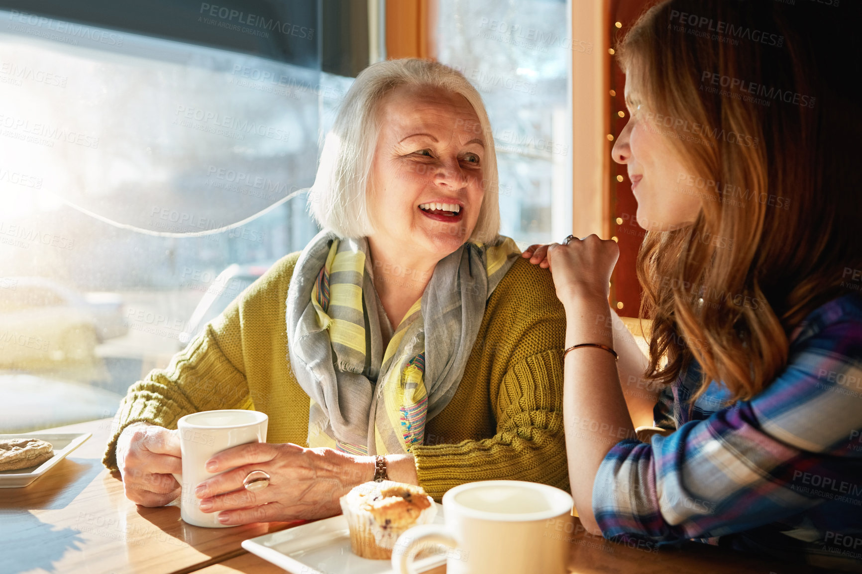 Buy stock photo Senior woman, smile and daughter with conversation in cafe with daughter for memories or bonding with relax. Coffee shop, restaurant and people with discussion, laugh and happy family with love.