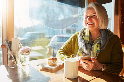 Buy stock photo Senior woman, smartphone and coffee in cafe for breakfast, app and digital menu with happy in city. Elderly person, muffin and smile in Sweden at restaurant with phone for email, chat or internet