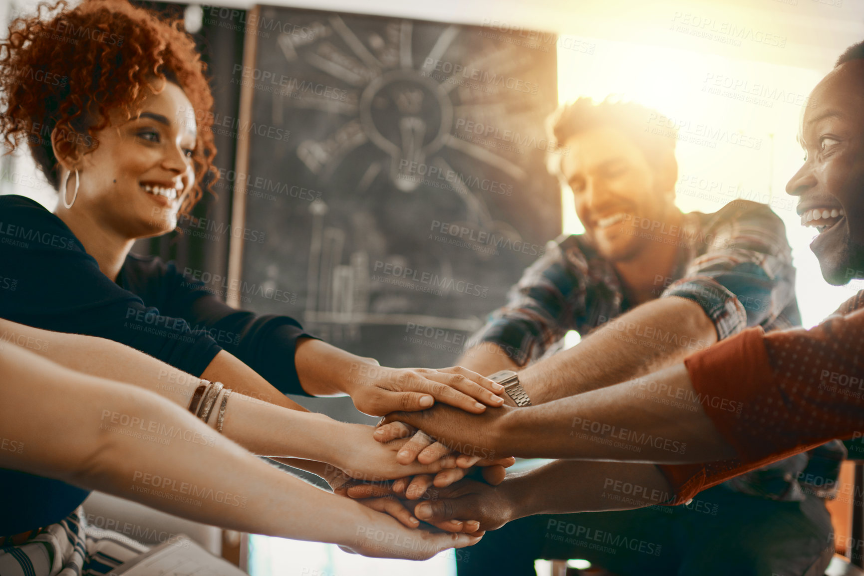 Buy stock photo Shot of creative employees hands huddled together at work