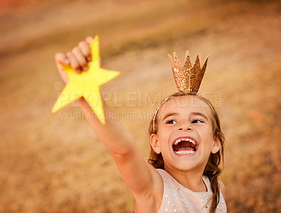 Buy stock photo Star, playing and child with crown in nature for princess fantasy, imagination or fun time. Happy, sweet and excited cute girl kid with toy outdoor in forest for joyful weekend laughing for youth.