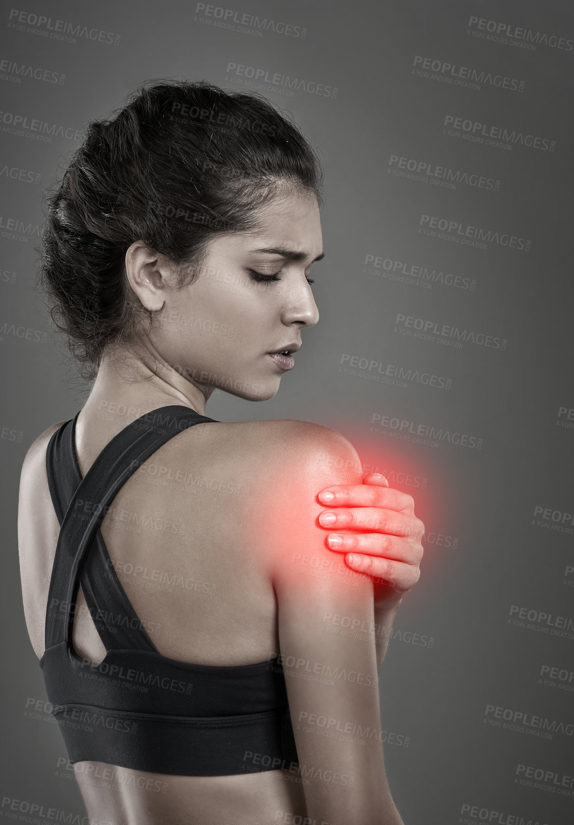 Buy stock photo Woman, shoulder pain and athlete for injury in studio, training accident and glow on gray background. Female person, sports and arthritis or risk of fibromyalgia, bruise and inflammation strain