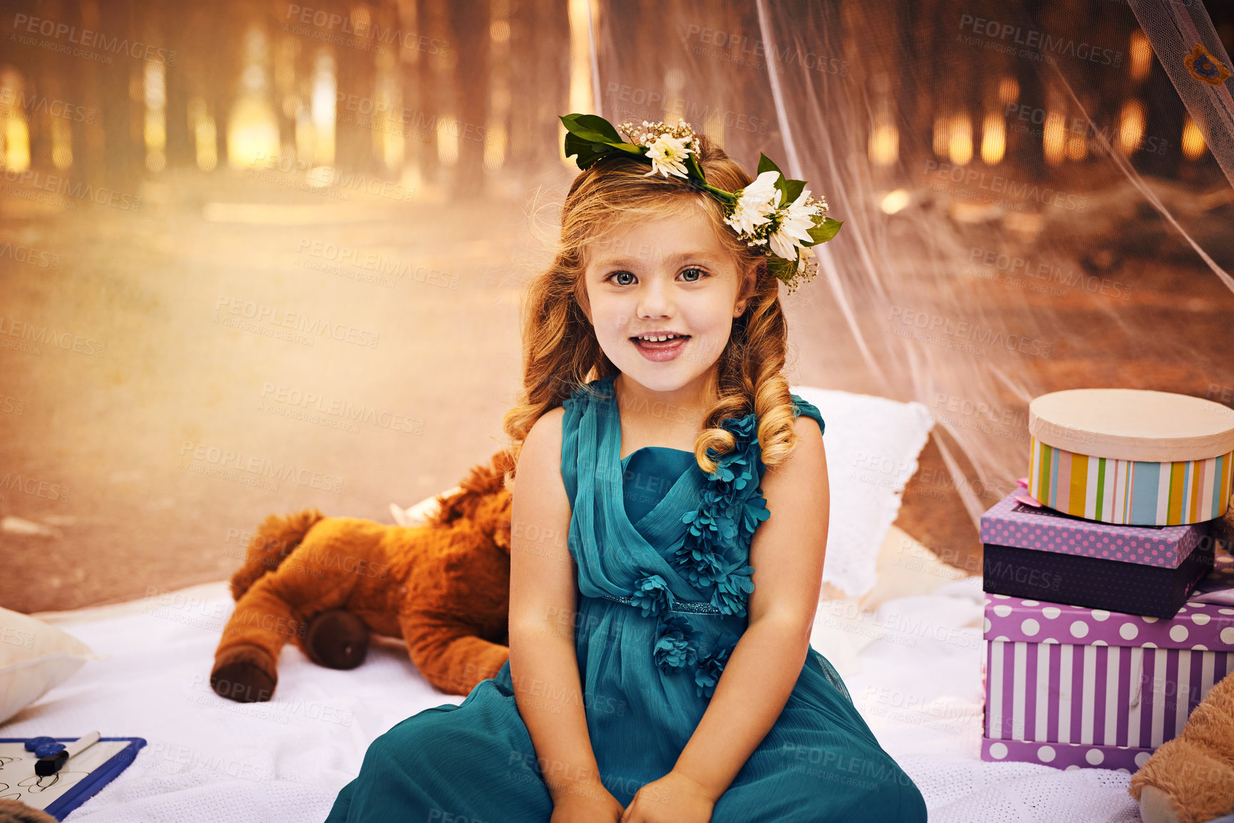 Buy stock photo Little girl, princess and portrait in nature for fantasy, themed birthday party and dress up for picnic. Child, smile and blanket in woods with toys for play, freedom and flower crown for aesthetic