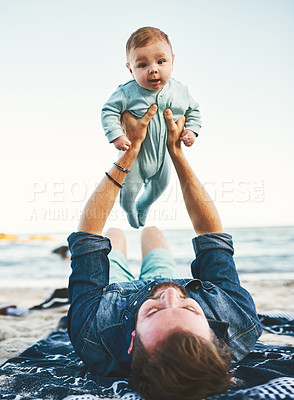 Buy stock photo Shot of a Father and son spending quality time at the beach