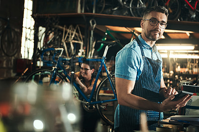 Buy stock photo Portrait, calculator and repair man in bicycle shop working in store for sales. Face, bike mechanic and serious male professional from Canada with glasses, pride and mature in cycling workshop.