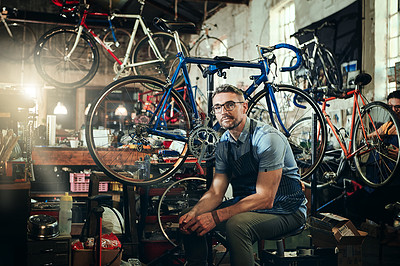 Buy stock photo Portrait, wrench and serious repair man in bicycle shop, store or cycling workshop. Face, bike mechanic and male person, business owner or mature professional technician with glasses and confidence.