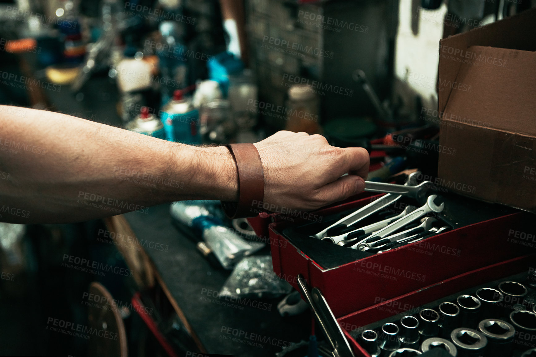 Buy stock photo Man, hand and tool box for mechanic, spanner and upgrade or maintenance service in garage. Male person, equipment and wrench for fixing gear or employee at small business, labor and auto workplace