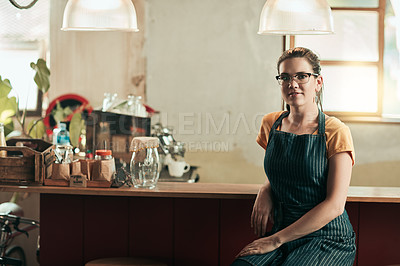 Buy stock photo Portrait of a young barista working in her coffee shop