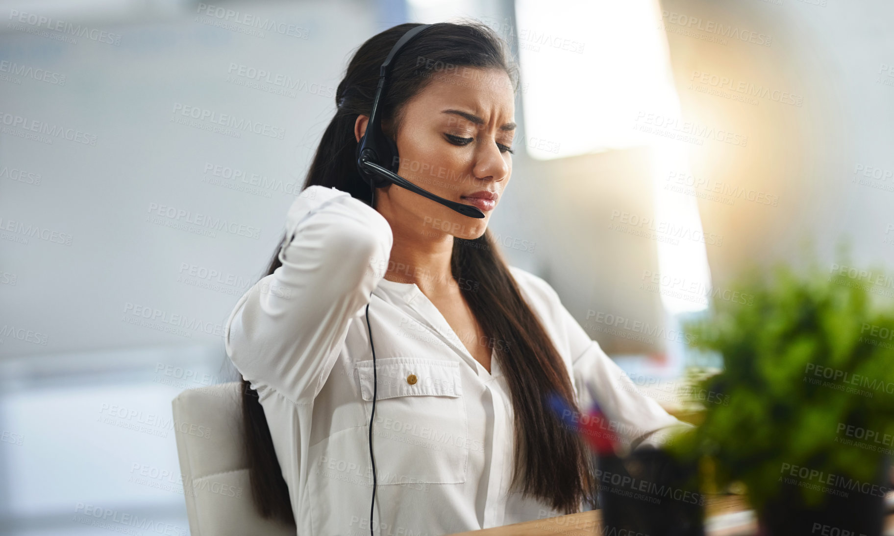 Buy stock photo Stress, customer service or woman in call center with back pain injury while working in telecom help desk. Accident, injured agent or tired sales girl with joint pain emergency, fatigue and burnout