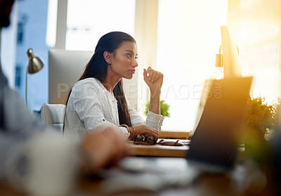 Buy stock photo Serious, office or woman typing on computer working on business project or online research at office desk. Thinking, girl or worker copywriting email on blog report or internet article with focus 