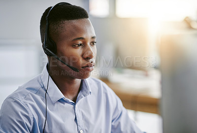 Buy stock photo Virtual assistant, consultant or black man in call center consulting online at customer services help desk. Contact us, email or serious African agent in telemarketing, CRM or telecom company office