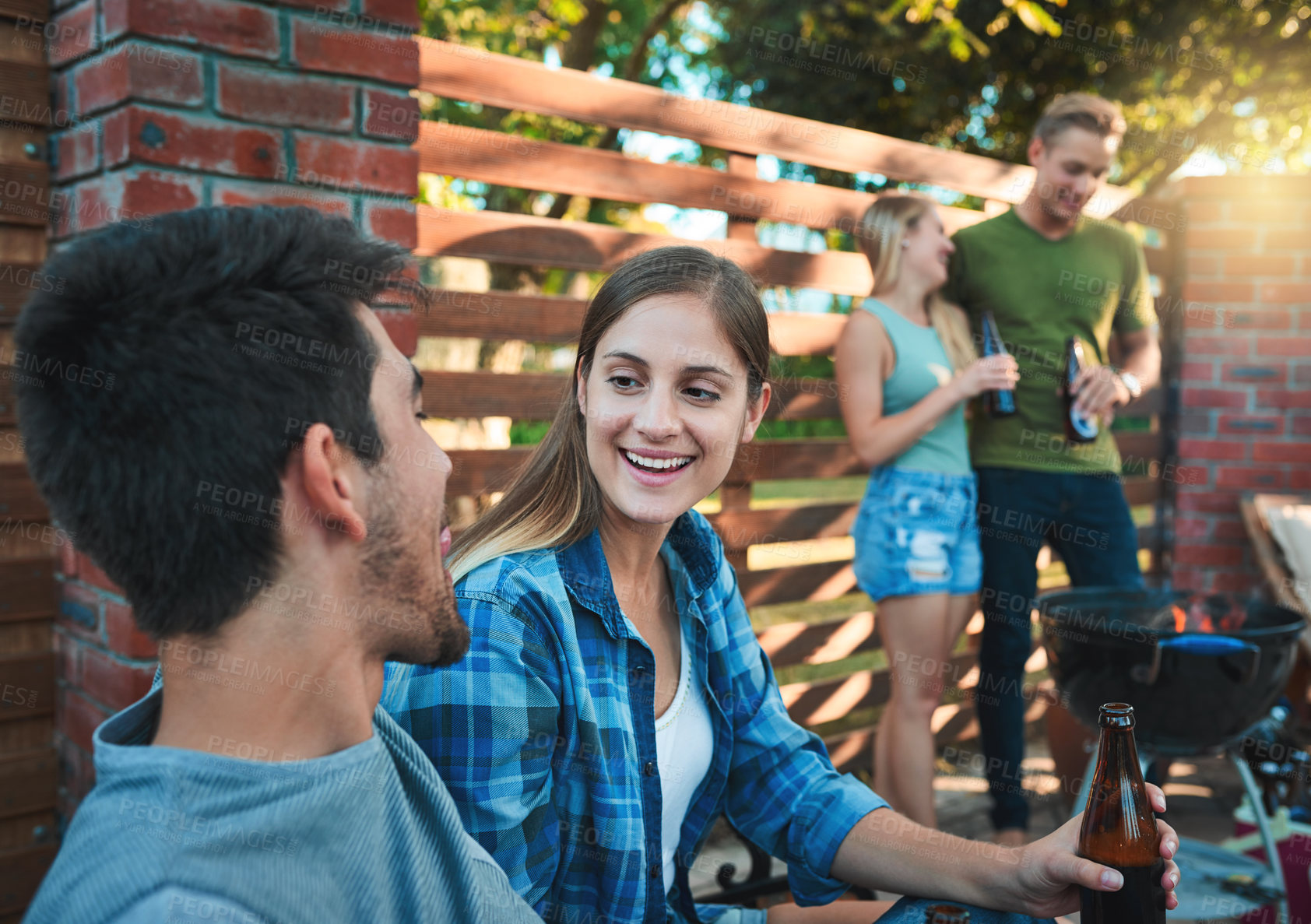 Buy stock photo Couple, barbecue and backyard with talk, party and labor day event with celebration and drinks outdoor. Holiday, reunion and happy people together with social group and conversation with friends