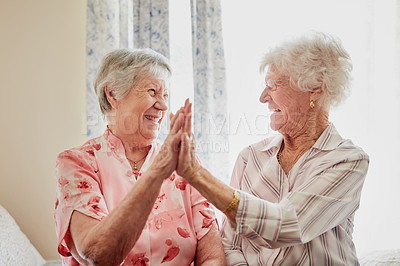 Buy stock photo Happy, success and senior women with high five for care, retirement support and happiness. Smile, love and elderly friends with excited gesture for solidarity or community in a nursing home together
