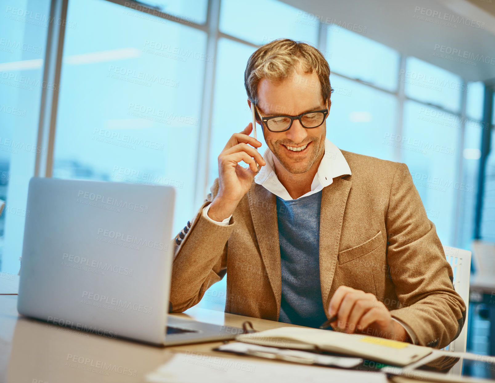 Buy stock photo Cropped shot of a handsome male designer working at his desk in the office