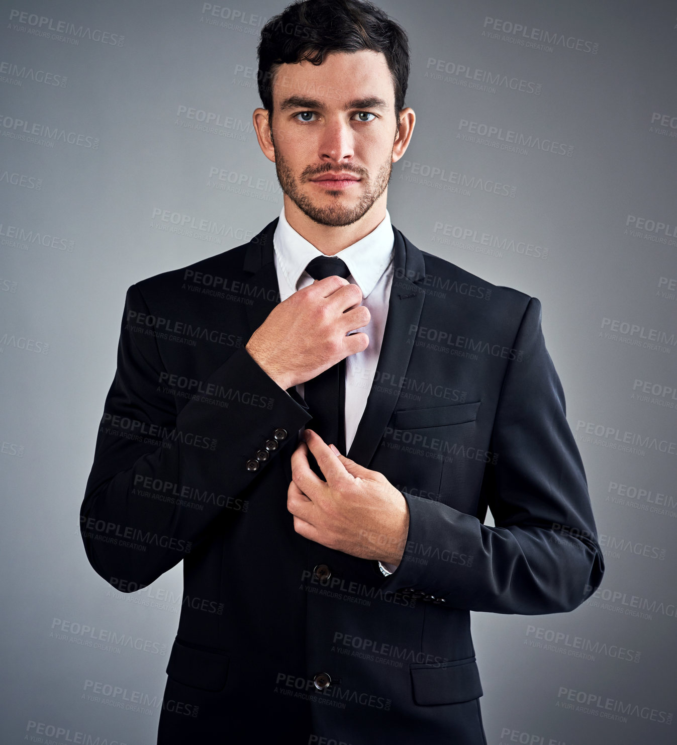 Buy stock photo Business man, suit and tie fix with portrait of professional corporate lawyer in studio getting ready. Confidence, grey background and executive fashion with entrepreneur, style and dress for success