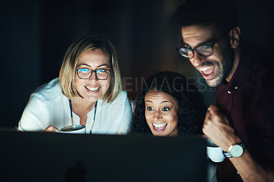 Buy stock photo Cropped shot of businesspeople working late in the office