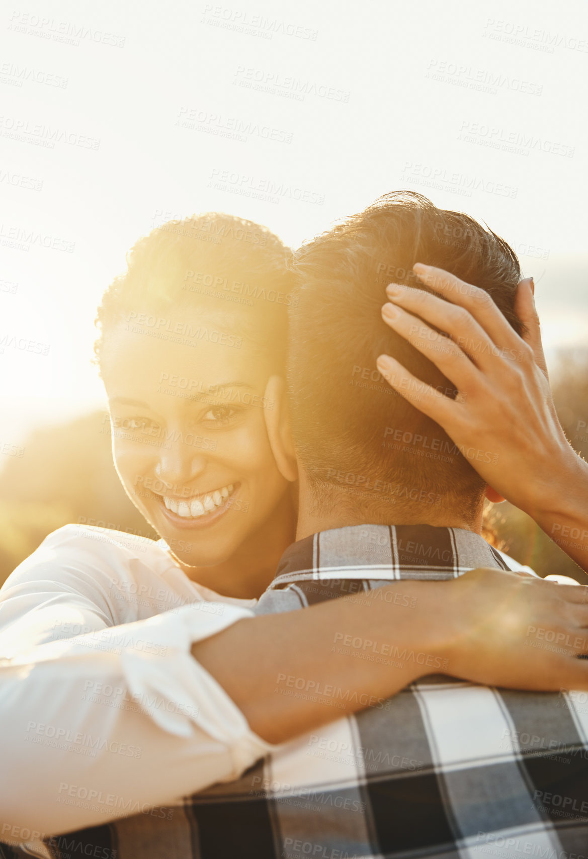 Buy stock photo Cropped shot of a loving couple  spending the day on the beach