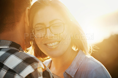 Buy stock photo Cropped shot of a loving couple  spending the day on the beach