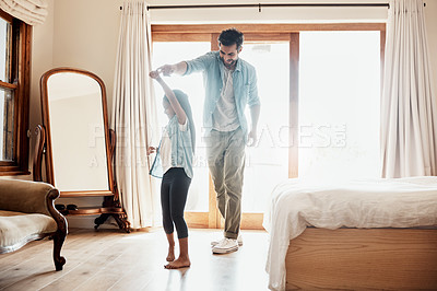 Buy stock photo Dancing, daughter and parent in bedroom for love, fathers day and development at home. Dad, young girl and together in family house for energy, entertainment and celebration in apartment for fun