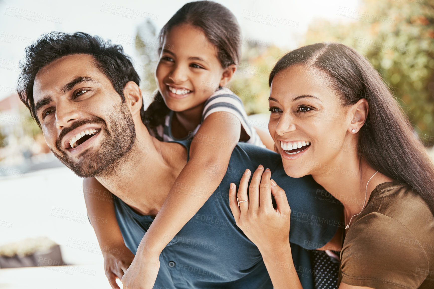 Buy stock photo Shot of a young family of three spending some quality time together