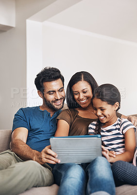 Buy stock photo Family on a couch, happiness and tablet with connection, social media and watching a cartoon. Parents, mother and father with female child, daughter or technology for a movie, film or bonding at home