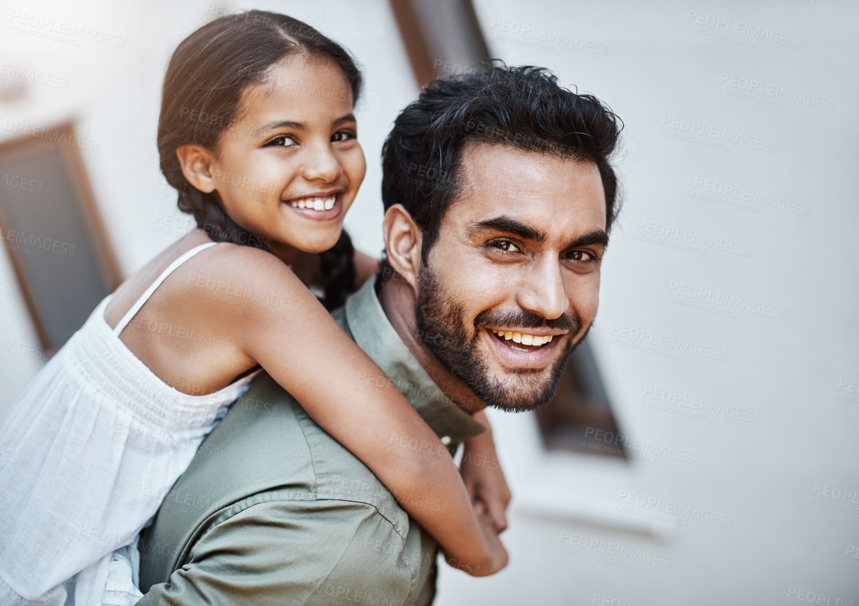 Buy stock photo Portrait, happy father and piggyback kid for family bonding, care and connection at home together. Face, girl and dad carry child at backyard for playing, support and funny parent laughing outdoor
