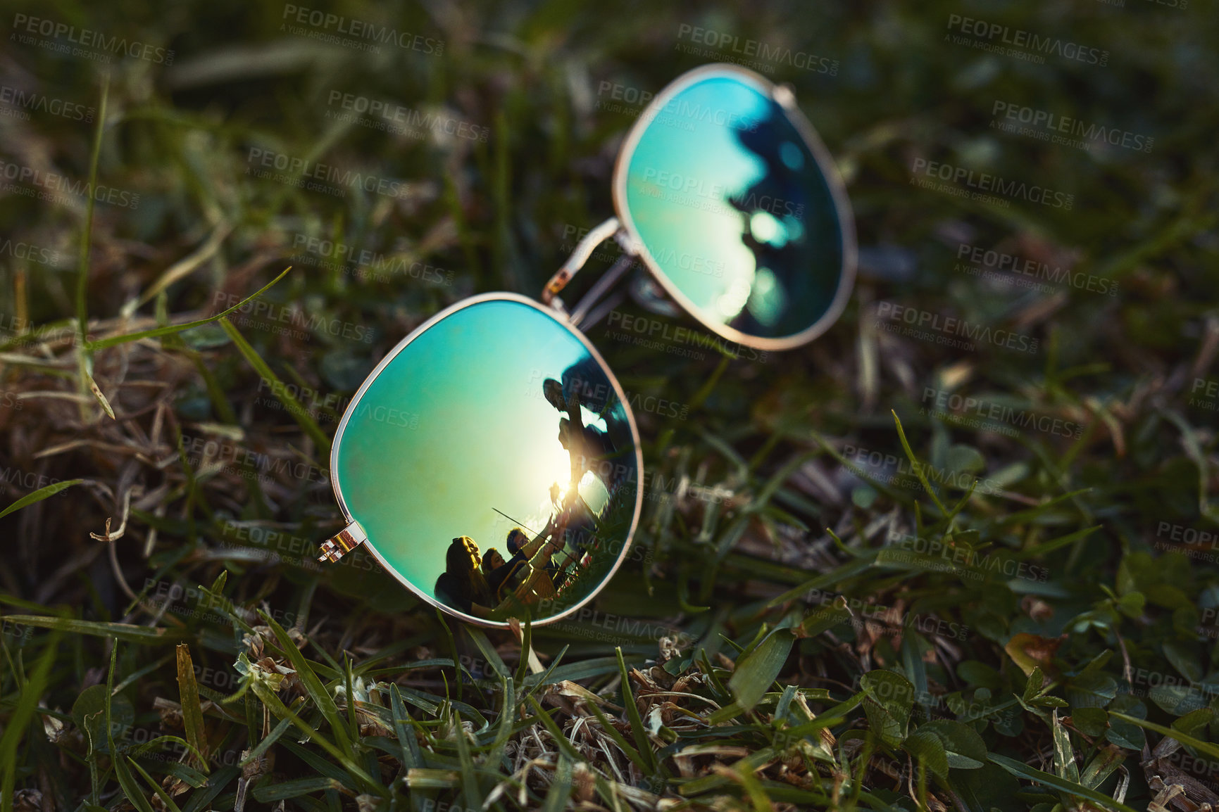 Buy stock photo High angle shot of sunglasses on a lawn
