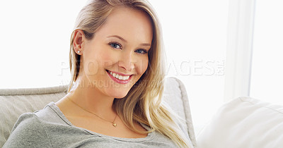 Buy stock photo Cropped portrait of an attractive young woman at home