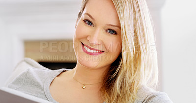 Buy stock photo Cropped portrait of an attractive young woman at home