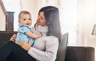 Buy stock photo Mom, baby and home with smile in sofa for bonding or support with love, growth and child development. Parent, toddler and happy with care, childhood memories and together with trust and joy on couch
