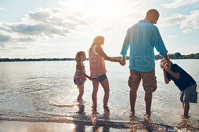 Buy stock photo Family, back and vacation in beach, holding hands and travel for summer, holiday and nature  of California. Parents, kids and adventure in tropical, sea and man with woman, together and children