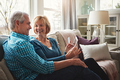 Buy stock photo Smile, credit card or tablet for senior couple on sofa for bank, payment or investment growth review at home. Online shopping, ecommerce or happy old people in living room for poker, bingo or sign up