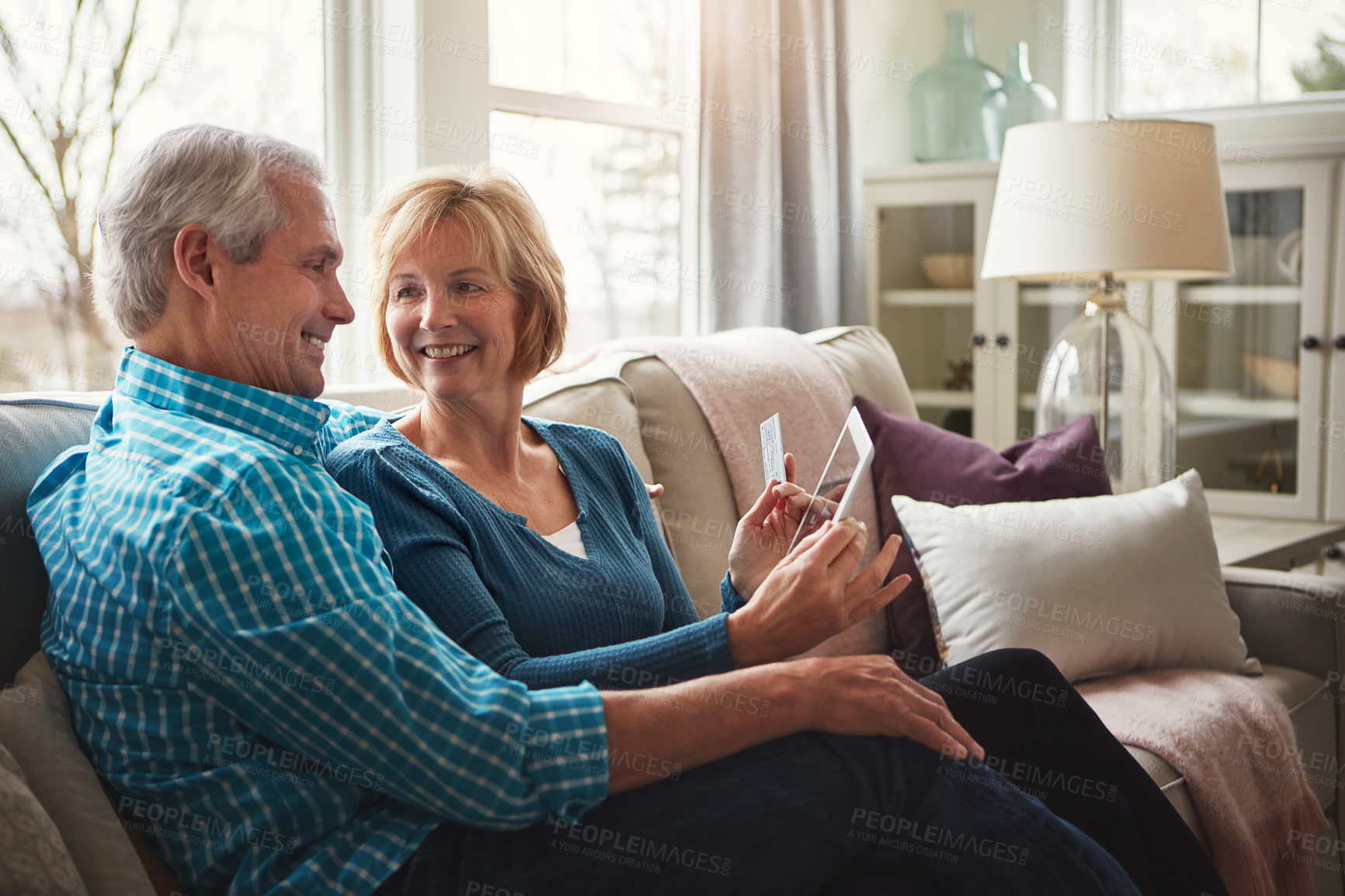 Buy stock photo Smile, credit card or tablet for senior couple on sofa for bank, payment or investment growth review at home. Online shopping, ecommerce or happy old people in living room for poker, bingo or sign up