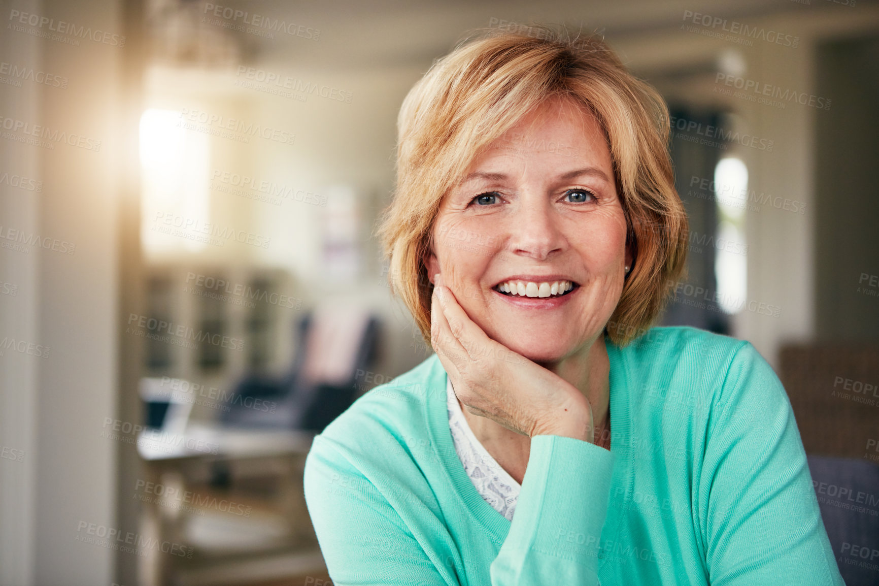 Buy stock photo Portrait of a mature woman relaxing at home