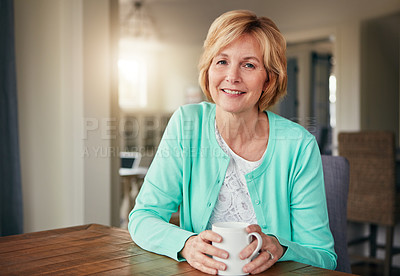 Buy stock photo Portrait of a mature woman relaxing at home