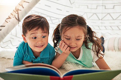 Buy stock photo Siblings, reading and tent in house with book for story time, education and literature adventure for storytelling. Boy, girl and children on floor for fantasy or bonding, learning and development.