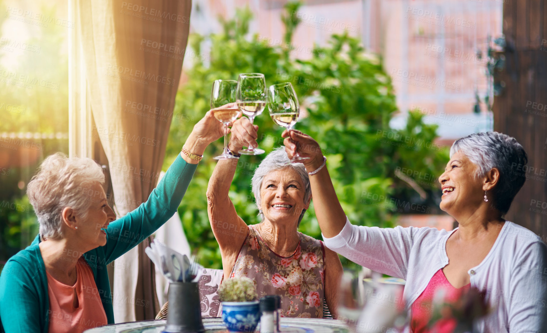 Buy stock photo Cheers, wine and elderly with friends in restaurant for bonding, lunch and relax. Retirement, hospitality and happiness with senior people with drink for social celebration, memory and support