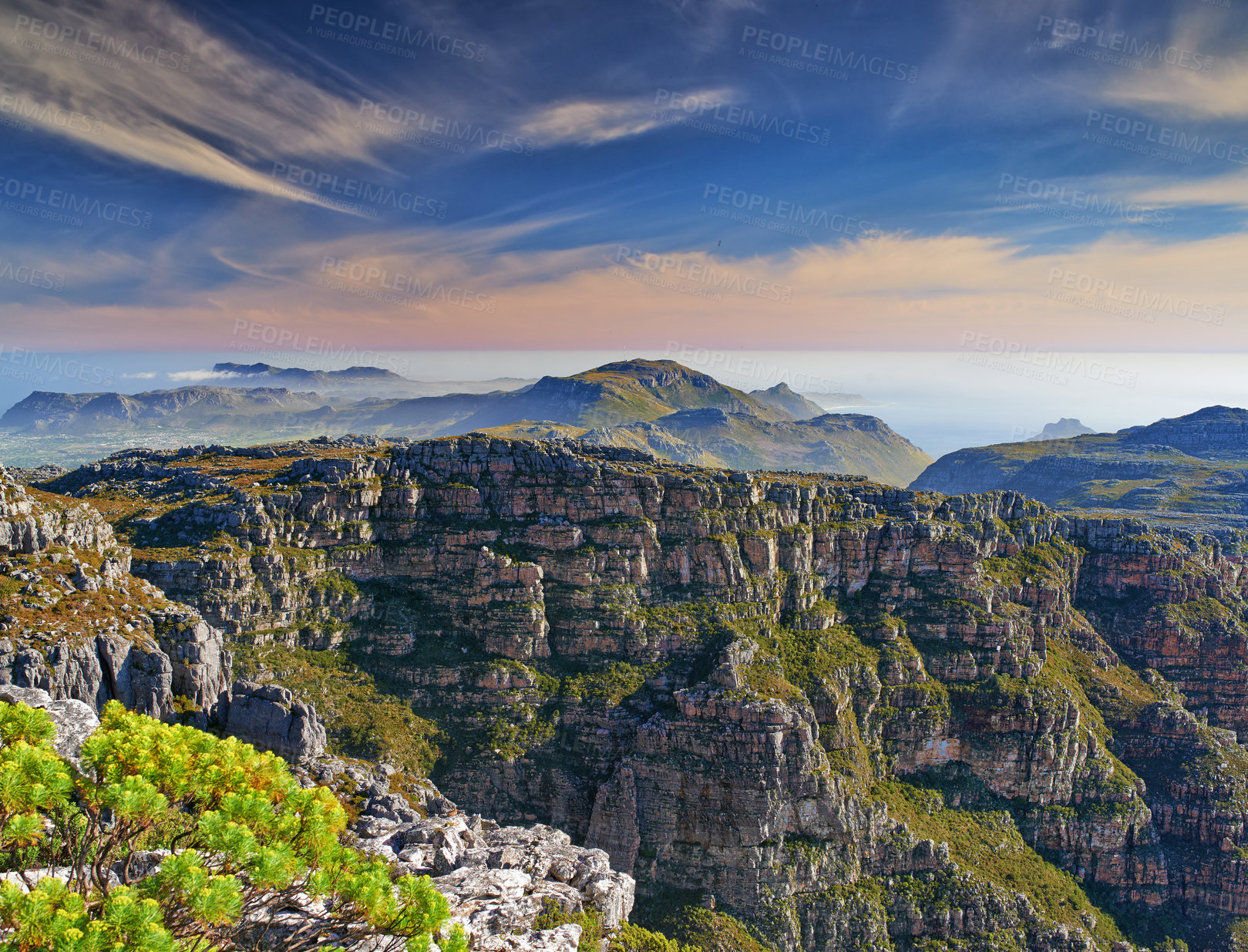 Buy stock photo Copy space with scenic landscape at the peak of Table Mountain in Cape Town with cloudy blue sky background. Breathtaking and magnificent views of the beauty in nature after a hike up a rocky region