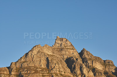 Buy stock photo Copyspace with scenic landscape of a mountain peak against a clear blue sky on a sunny day. Scenic view of Table Mountain in Cape Town, South Africa in summer. Wide angle view of a nature background