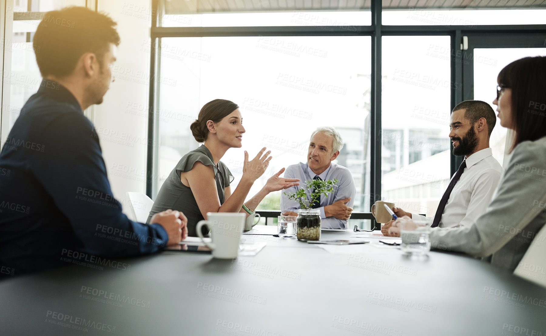 Buy stock photo Shot of corporate businesspeople in the office