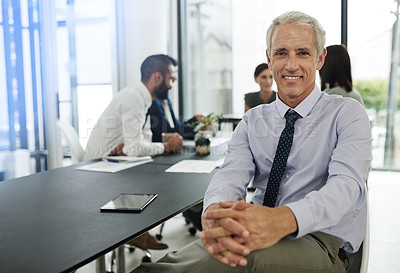 Buy stock photo Shot of corporate businesspeople in the office
