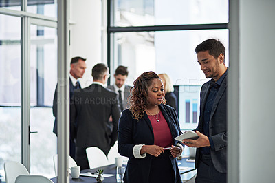 Buy stock photo Shot of corporate businesspeople meeting in the boardroom