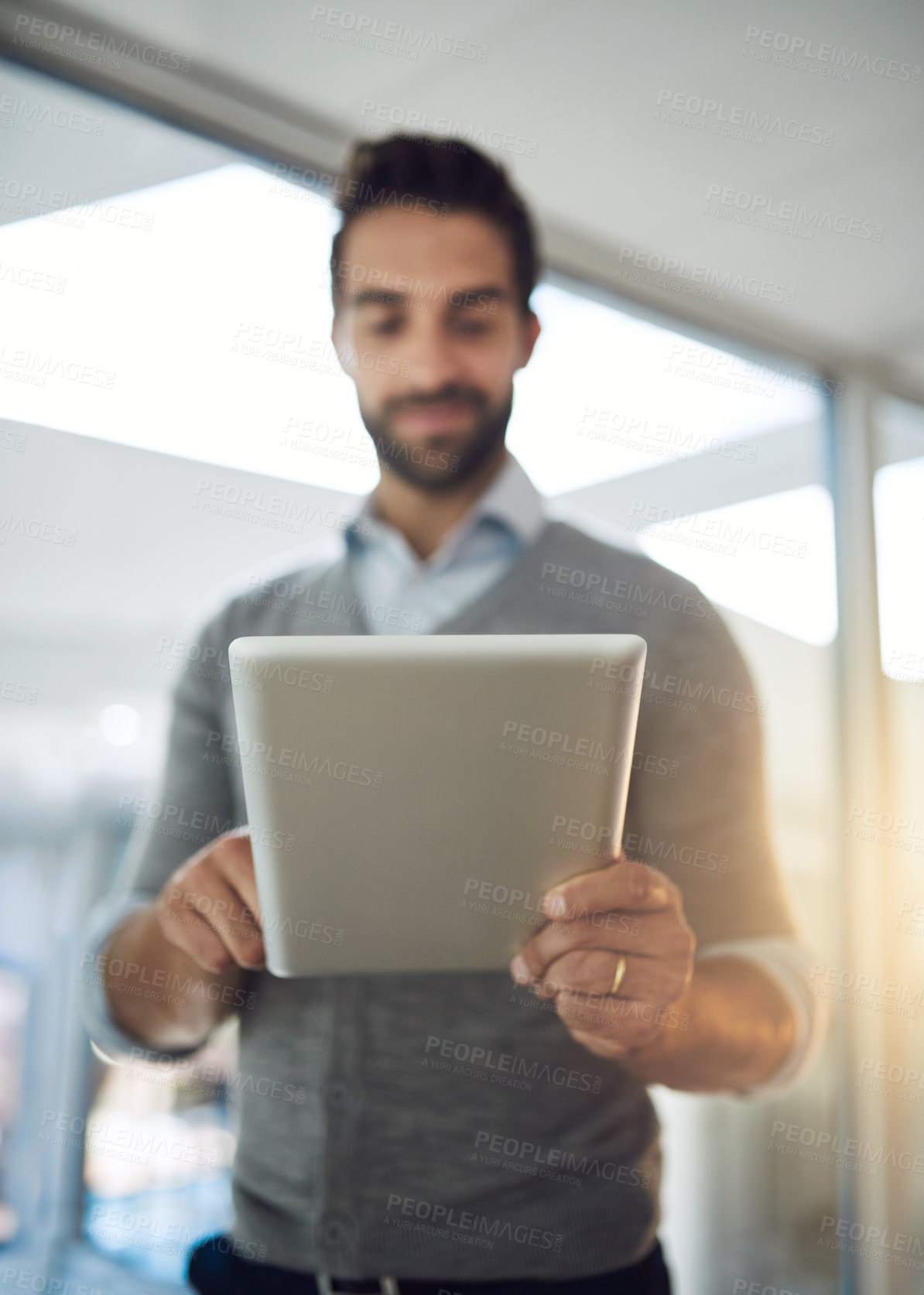 Buy stock photo Cropped shot of a businessman working in his office